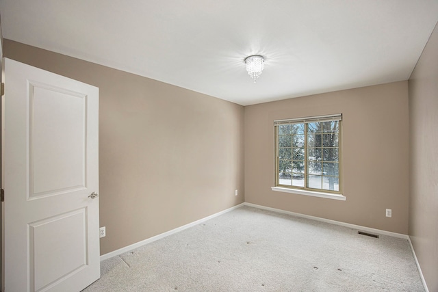 view of carpeted spare room