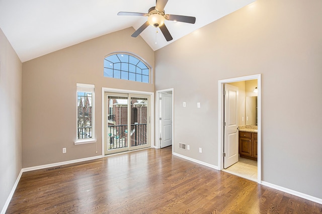 interior space with high vaulted ceiling, light wood-type flooring, and ceiling fan