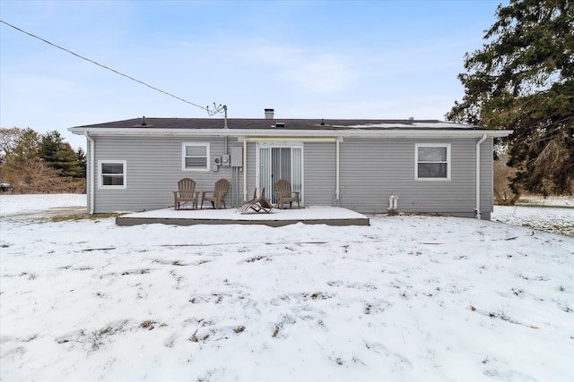 view of snow covered property