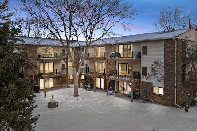 view of snow covered house