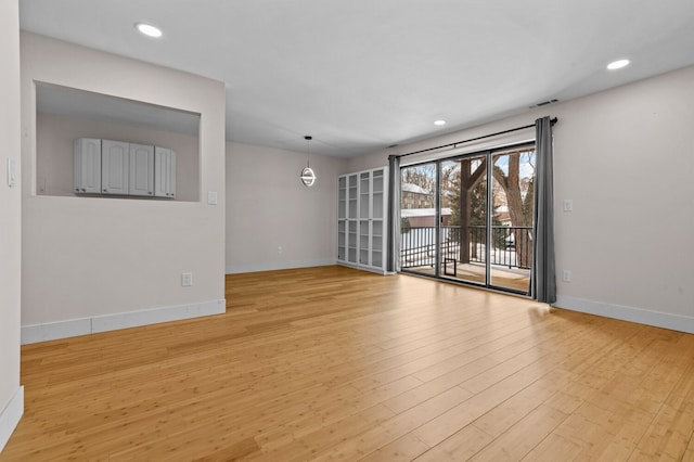 empty room with light wood-type flooring