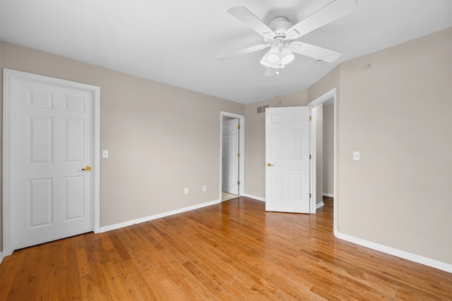 unfurnished bedroom with light hardwood / wood-style flooring and ceiling fan