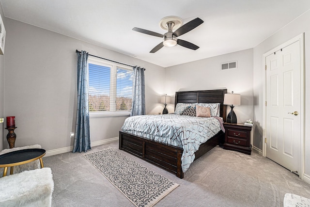 carpeted bedroom with ceiling fan