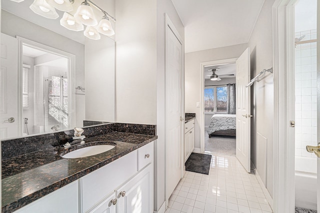 bathroom with enclosed tub / shower combo, vanity, tile patterned floors, and ceiling fan with notable chandelier