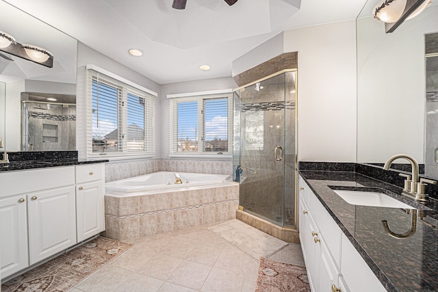 bathroom featuring shower with separate bathtub, vanity, tile patterned flooring, and ceiling fan