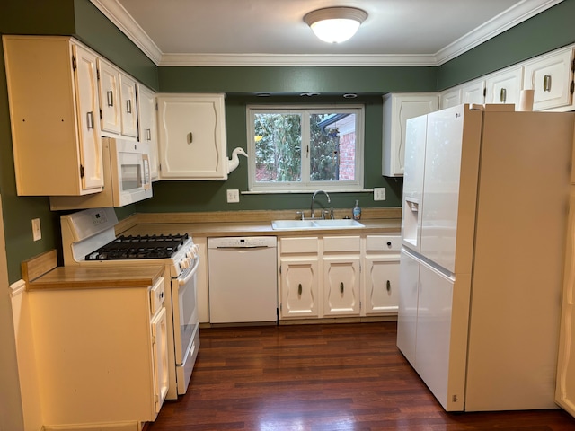 kitchen featuring dark hardwood / wood-style flooring, white appliances, white cabinetry, and sink