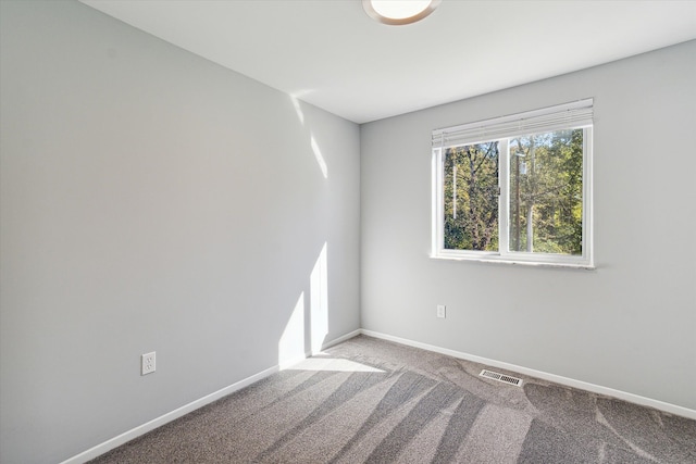 view of carpeted spare room