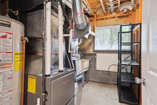 utility room featuring gas water heater