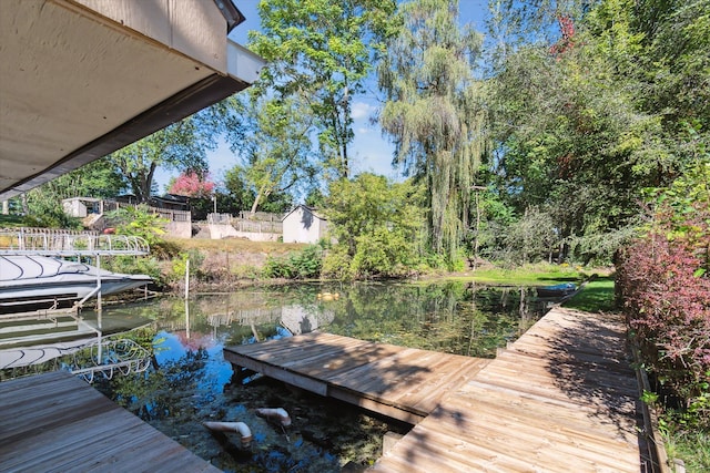 view of dock featuring a water view