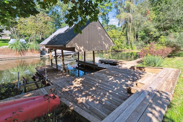 dock area with a water view