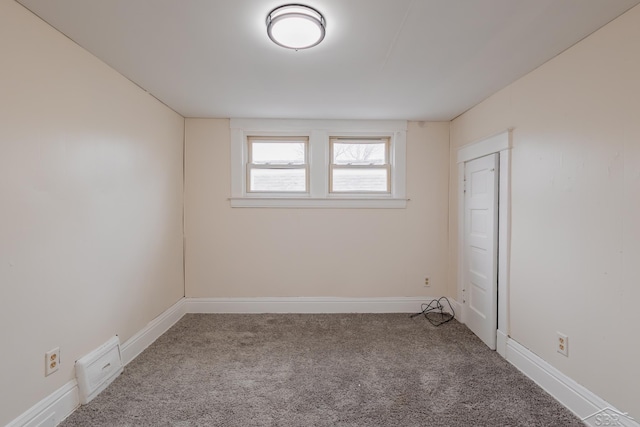 empty room with carpet floors