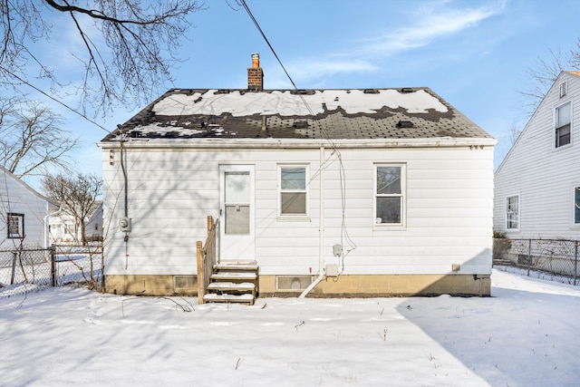 view of snow covered property