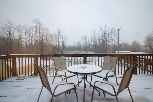 view of snow covered deck