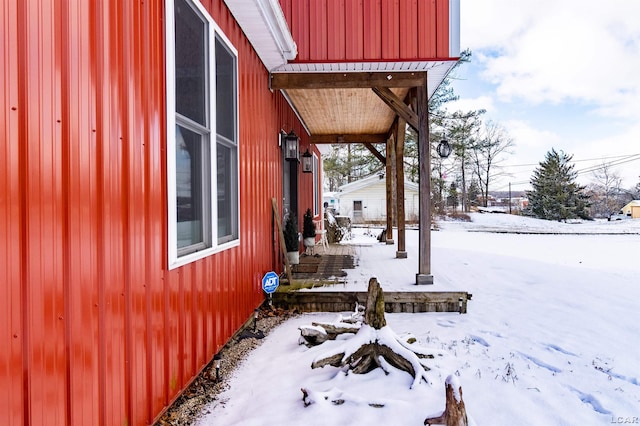 view of snow covered property