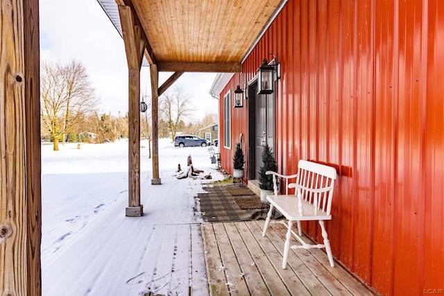 view of snow covered deck