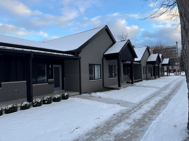 view of snow covered property