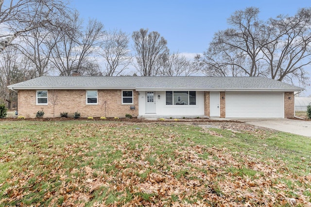 single story home with a garage and a front yard