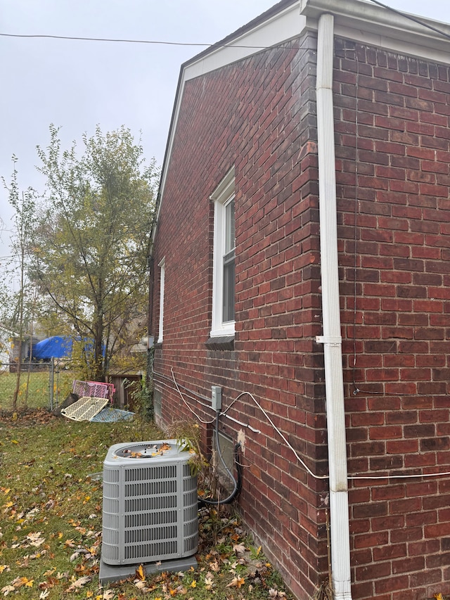 view of side of home with cooling unit