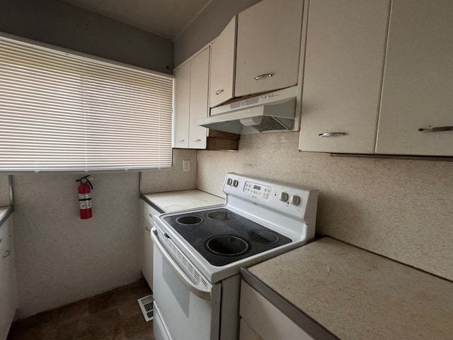 kitchen with white range with electric stovetop