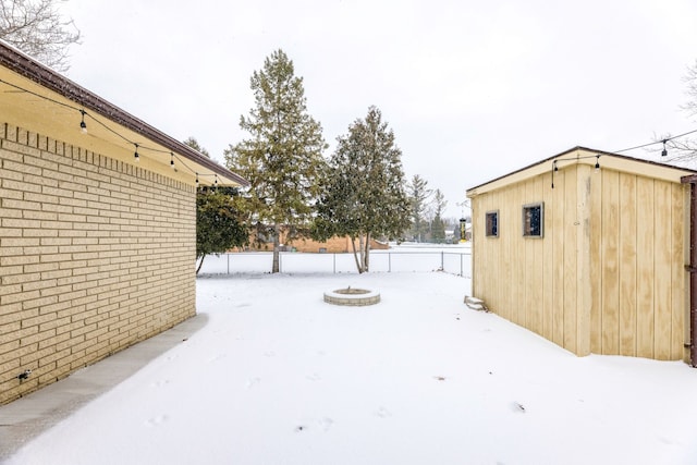 view of yard covered in snow