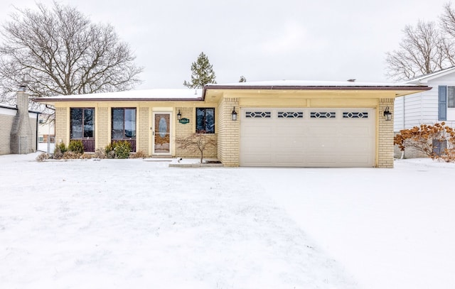 single story home with a garage