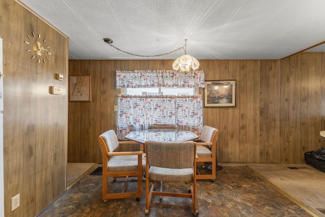 dining area with wooden walls