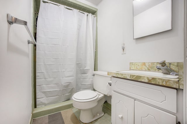 bathroom featuring vanity, tile patterned floors, toilet, and a shower with shower curtain