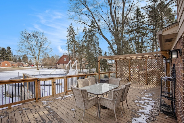 view of snow covered deck