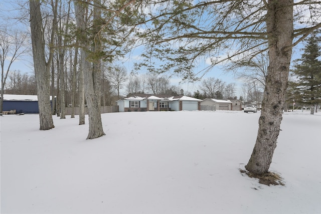 view of yard covered in snow