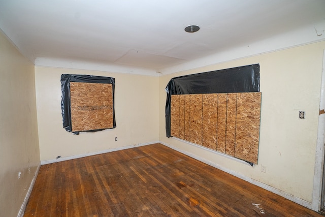 empty room featuring hardwood / wood-style flooring