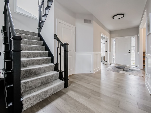 foyer entrance featuring light hardwood / wood-style flooring