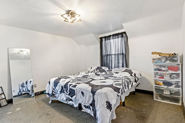 bedroom featuring lofted ceiling