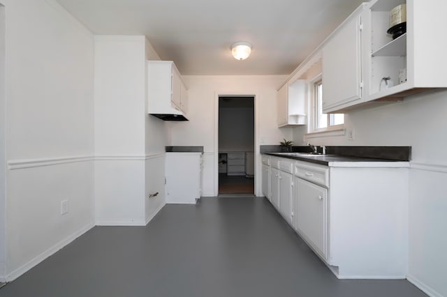 kitchen with sink and white cabinets