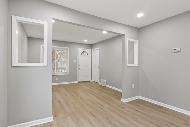 foyer entrance featuring light wood-type flooring