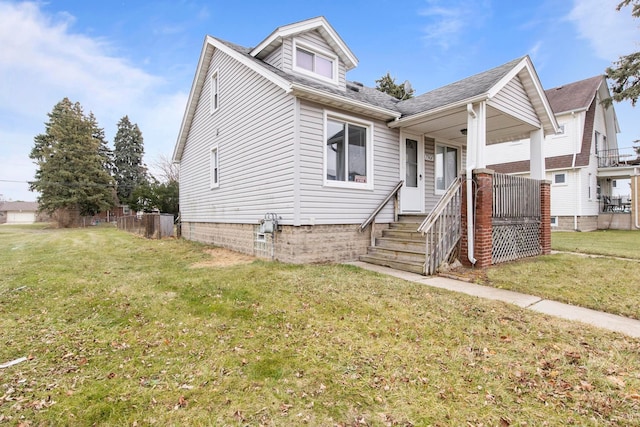 view of front of home with a front lawn and a porch