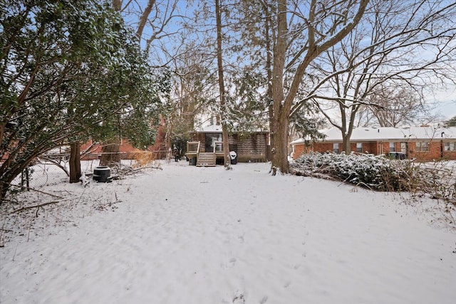 view of yard covered in snow