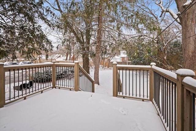 view of snow covered deck