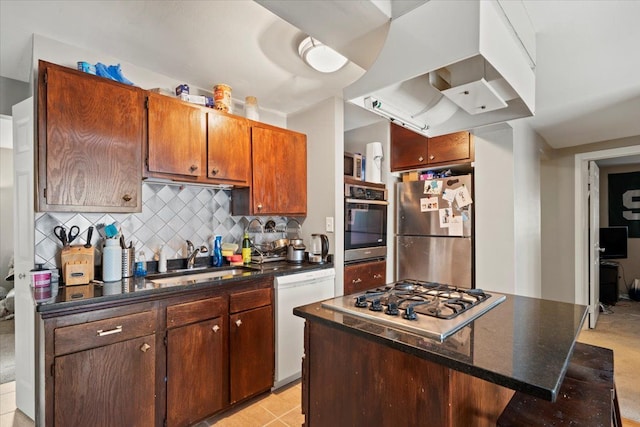 kitchen featuring tasteful backsplash, a kitchen island, island exhaust hood, sink, and stainless steel appliances