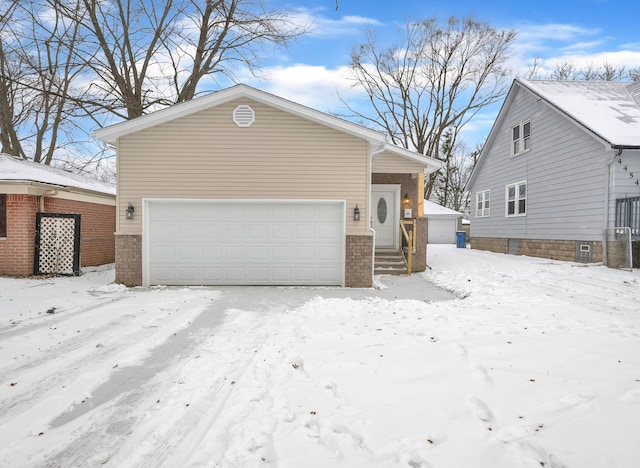 view of front of home with a garage