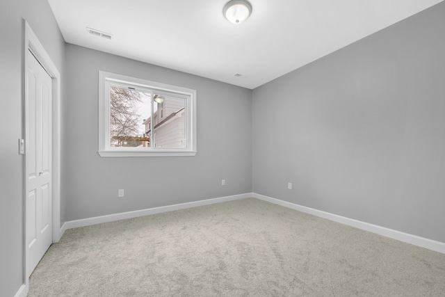 unfurnished bedroom with light carpet