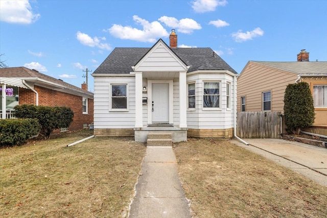 bungalow with a front lawn