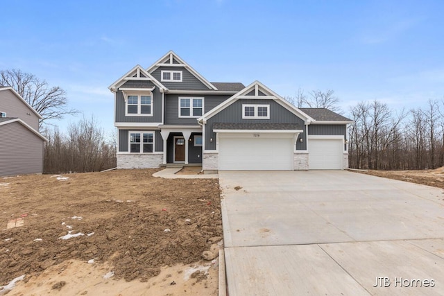 craftsman house featuring a garage