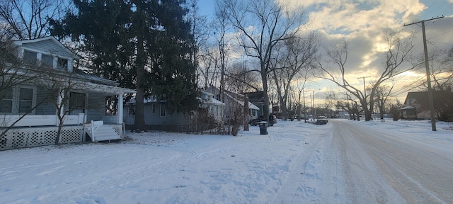 view of yard layered in snow