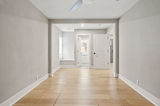 corridor featuring light wood-type flooring