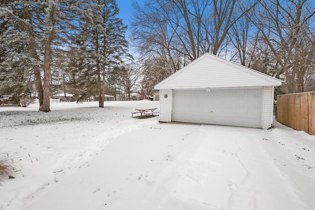 view of snow covered garage