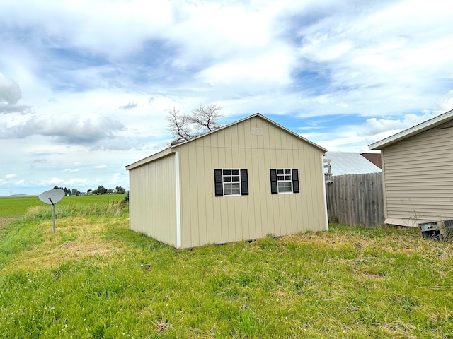 view of outdoor structure featuring a yard