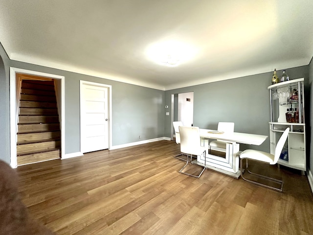 dining room with hardwood / wood-style flooring