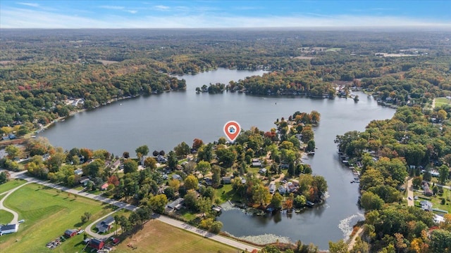 birds eye view of property with a water view