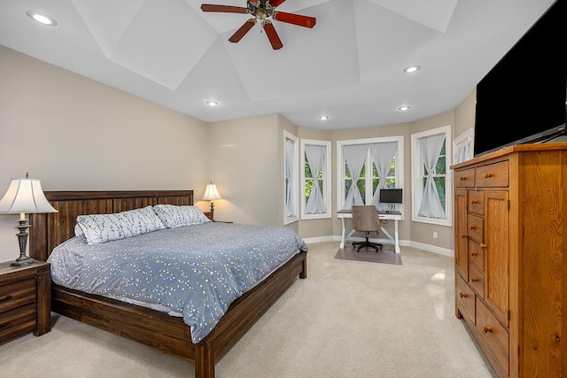 bedroom featuring light carpet and ceiling fan