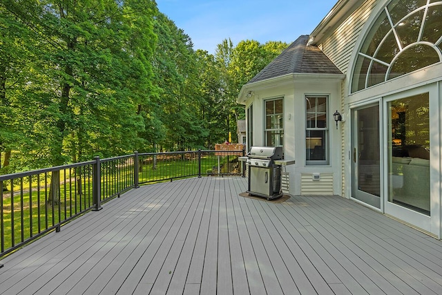 deck featuring a grill